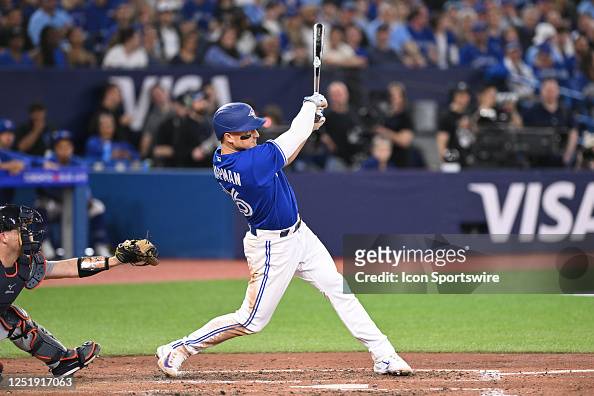 Toronto Blue Jays third baseman Matt Chapman swings and hits the ball ...