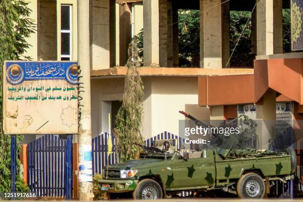 Technical" vehicle of Sudan's Rapid Support Forces paramilitaries is stationed outside the offices of Dar al-Mushaf , in the south of Sudan's capital...