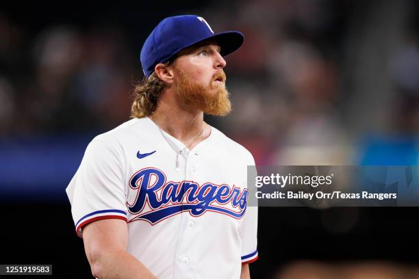 Jon Gray of the Texas Rangers walks back to the dugout during a game against the Baltimore Orioles at Globe Life Field on April 3, 2023 in Arlington,...