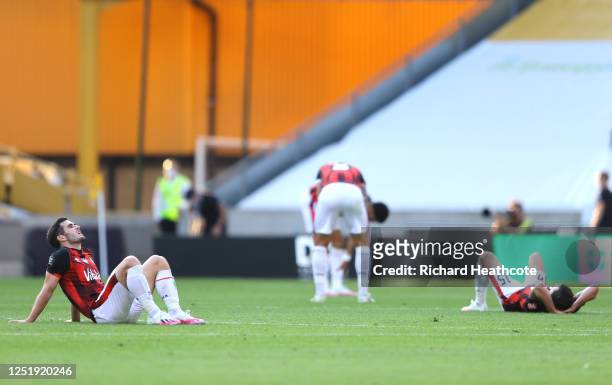 Lewis Cook of AFC Bournemouth and Adam Smith of AFC Bournemouth reacts at the full time whistle during the Premier League match between Wolverhampton...