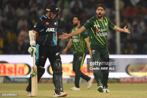 Pakistan's Haris Rauf celebrates after taking the wicket of New Zealand's captain Tom Latham during the third Twenty20 international cricket match...