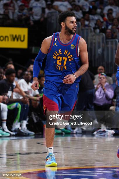 Jamal Murray of the Denver Nuggets celebrates and runs up court against the Minnesota Timberwolves during Round 1 Game 1 of the 2023 NBA Playoffs on...