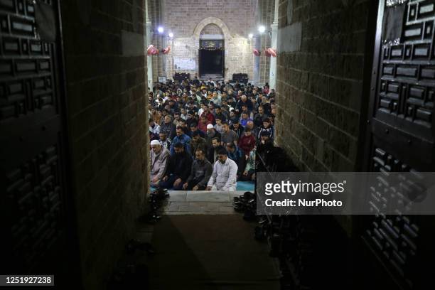 Palestinian devotees pray on Laylat al-Qadr at Omari mosque during the Muslim holy month of Ramadan in Gaza City, on April 17, 2023. - Laylat al-Qadr...