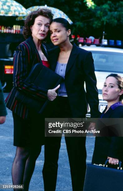 A CBS television legal drama series. Premiere episode broadcast September 20, 1999. Pictured from left is Dixie Carter , Victoria Rowell and Meredith...
