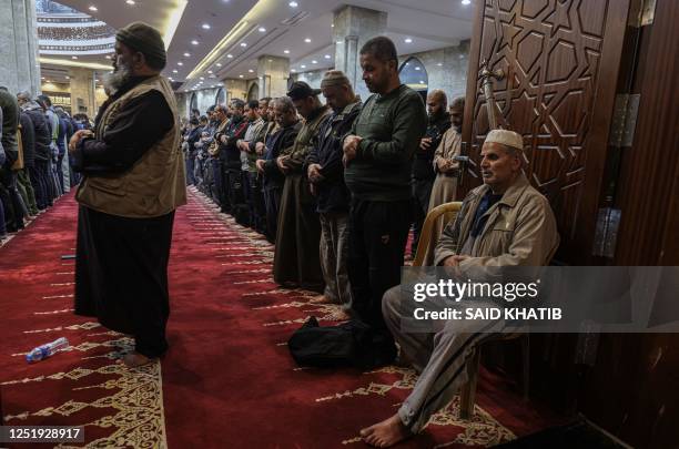 Palestinian worshippers pray at Al-Awda mosque during the Muslim holy month of Ramadan in Rafah town in the southern, on April 17 - on the night of...