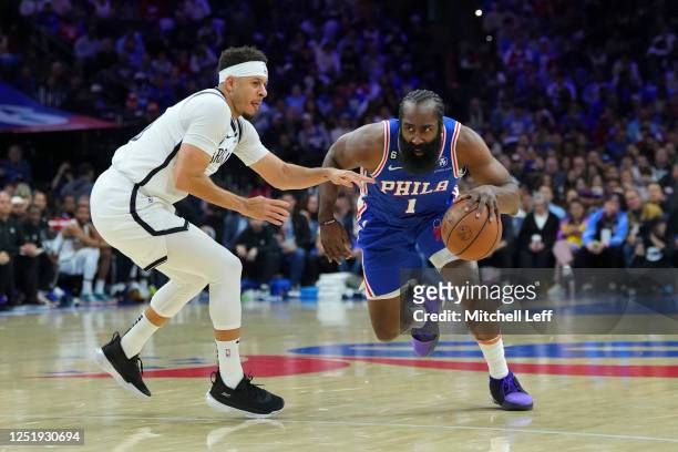James Harden of the Philadelphia 76ers drives to the basket against Seth Curry of the Brooklyn Nets in the second quarter during Game Two of the...