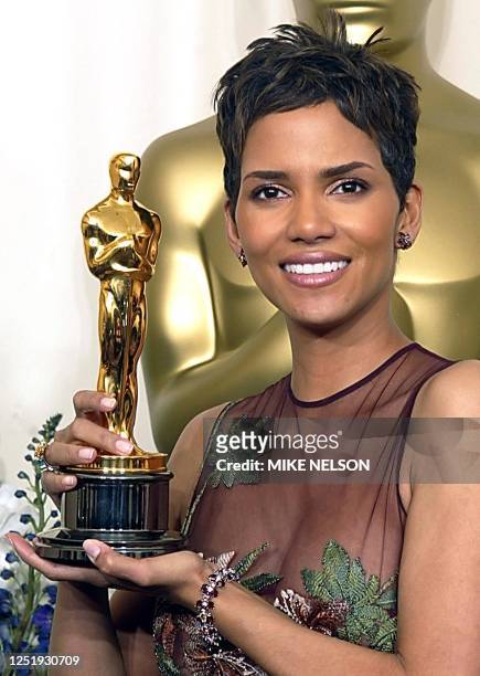 Actress Halle Berry holds her Oscar for best actress in a leading role for her portrayal of Leticia Musgrove, a woman struggling to raise her son...