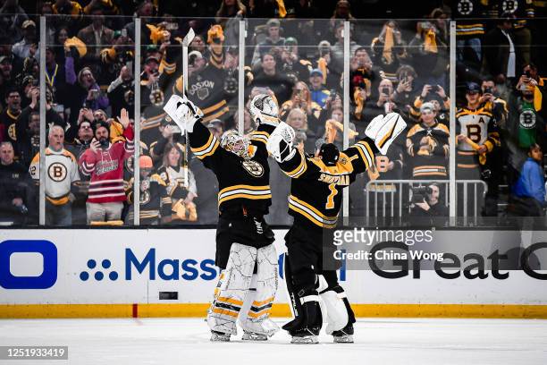 Linus Ullmark of the Boston Bruins and Jeremy Swayman celebrate their win against the Florida Panthers in Game One of the First Round of the 2023...
