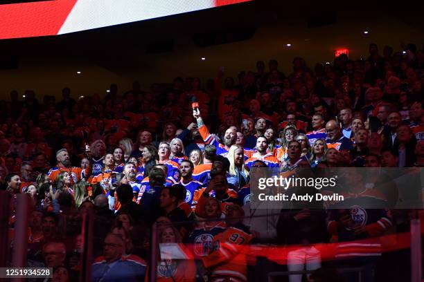 Robert Clark performs the national anthem while holding the microphone to the fans before Game One of the First Round of the 2023 Stanley Cup...