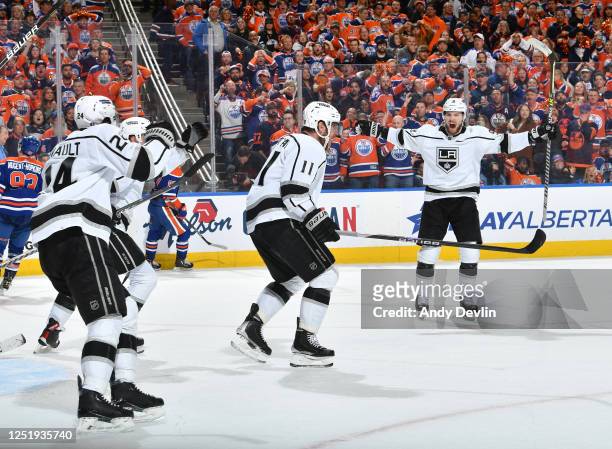 Anze Kopitar of the Los Angeles Kings celebrates after his third period goal against the Edmonton Oilers with Phillip Danault, Adrian Kempe and...