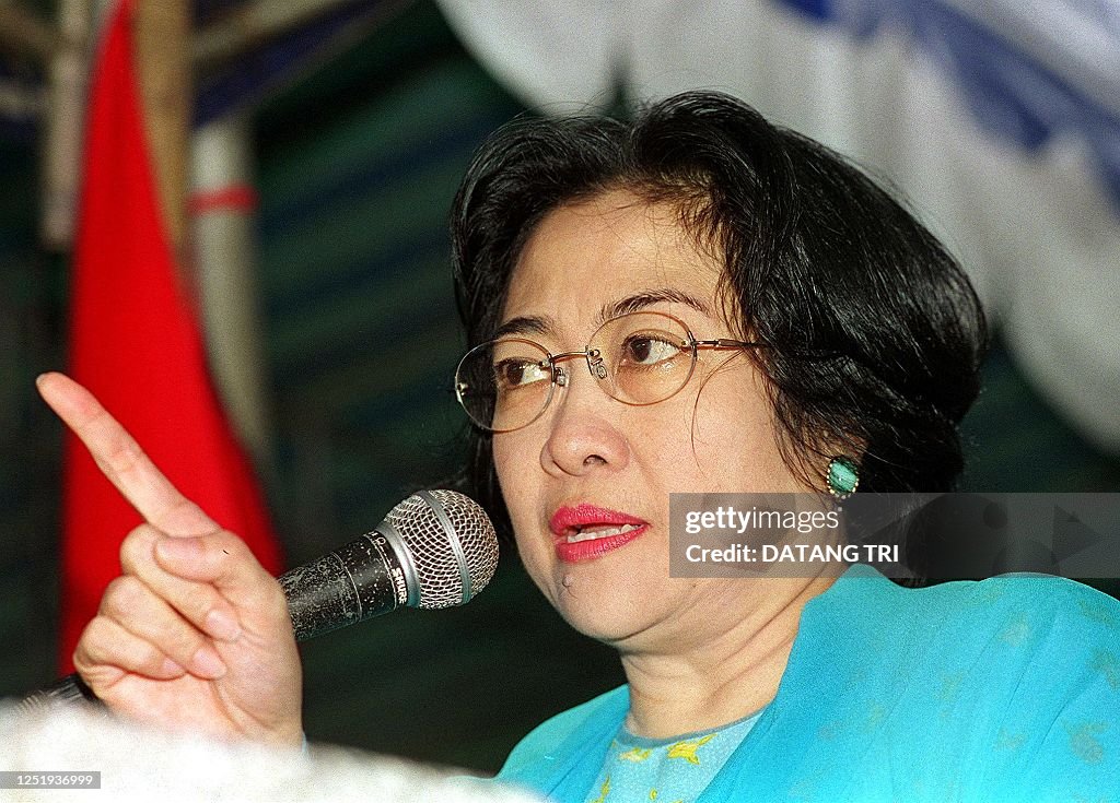 Opposition leader Megawati Sukarnoputri speaks to a crowd of... News ...