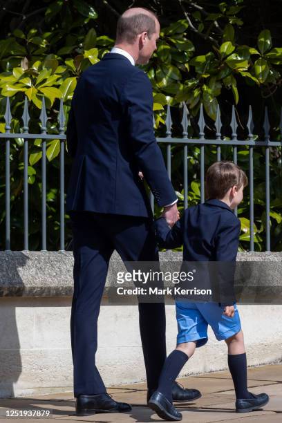 Prince William, Prince of Wales, and Prince Louis depart after attending the Easter Sunday church service at St George's Chapel in Windsor Castle on...