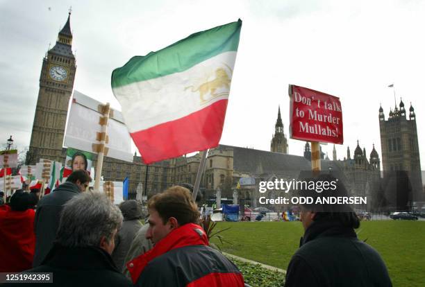 British exile Iranians protest at Parliament square in London 06 February 2003 against the official visit of Iranian foreign minister Kamal Kharazi...