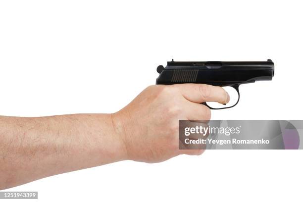 hand with gun isolated on white background - 拳銃 ストックフォトと画像