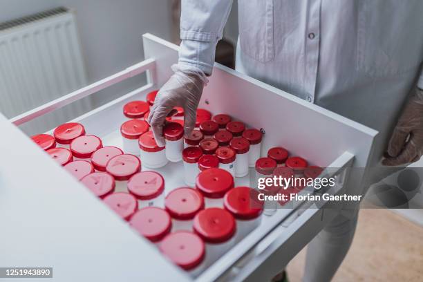 An employee of a pharmacy is pictured in small-scale preparation on April 13, 2023 in Niesky, Germany.