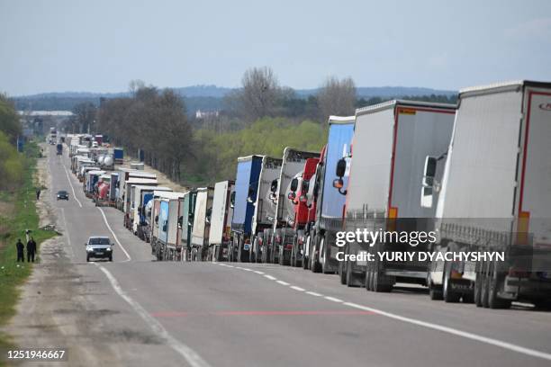 Truck drivers queue on over ten kilometers at the Rava-Ruska border checkpoint on the Ukrainian-Polish border, on April 18, 2023. - Ukraine and...