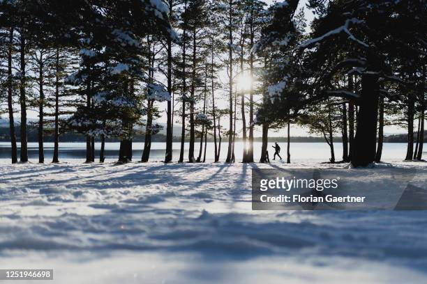 Sportman is pictured as silhouette at the Cairngorm National Park on March 08, 2023 in Glenmore, United Kingdom.