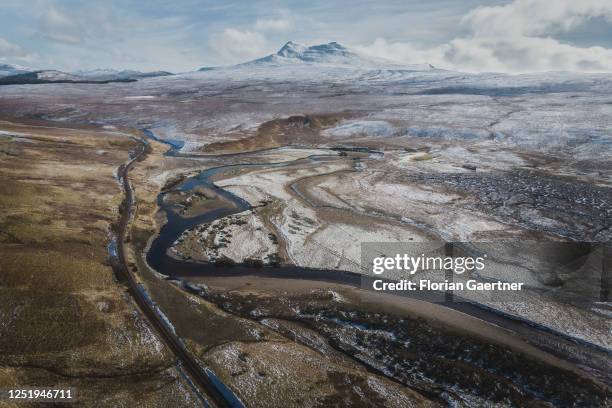 Landscape with snow-covered mountains is pictured on March 09, 2023 in Achnasheen, United Kingdom.