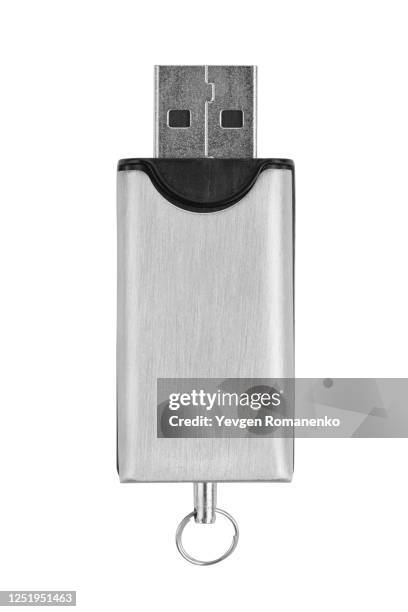 usb flash drive closeup on white background - clé usb photos et images de collection