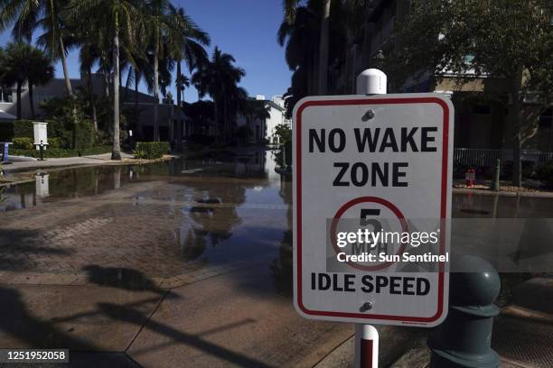 King tide flooding is seen in the area of the Intracoastal Waterway and Oakland Park Boulevard in Fort Lauderdale, Florida on Oct. 10, 2022.