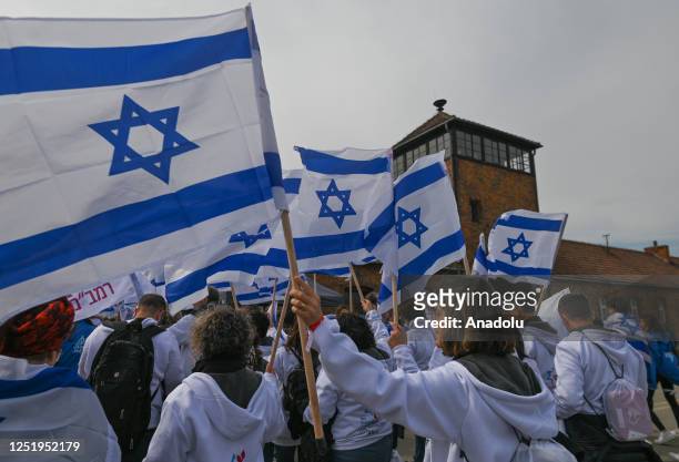 Group of participants seen during the 'March of the Living' at the former Nazi-German Auschwitz Birkenau concentration and extermination camp...