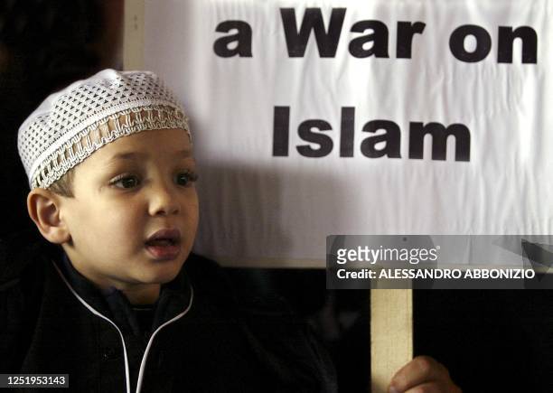 Young Muslim boy takes part in a demonstration in London 30 April 2005, where Muslims expressed their firm opposition to draconian anti-terror...