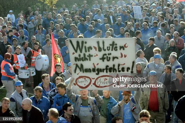 Employees of German car maker Volkswagen protest to turn up the pressure on their company's management ahead of a crucial round of wage talks on 27...