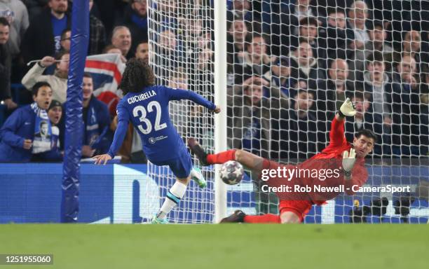 Real Madrid's Thibaut Courtois saves from Chelsea's Marc Cucurella during the UEFA Champions League quarterfinal second leg match between Chelsea FC...