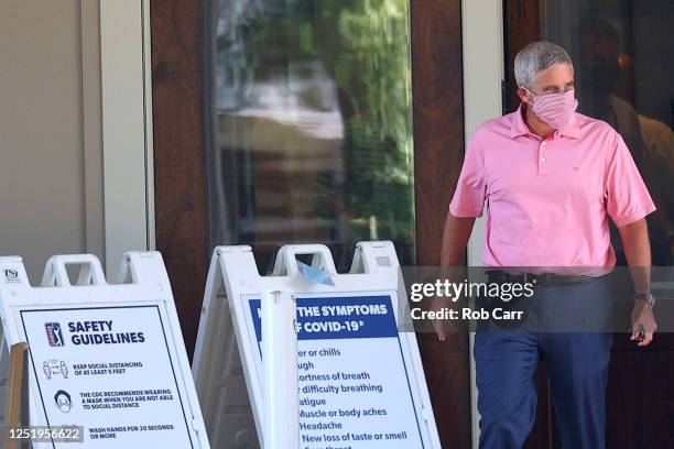 Tour Commissioner Jay Monahan leaves the clubhouse after a virtual press conference during a practice round for the Travelers Championship on June...