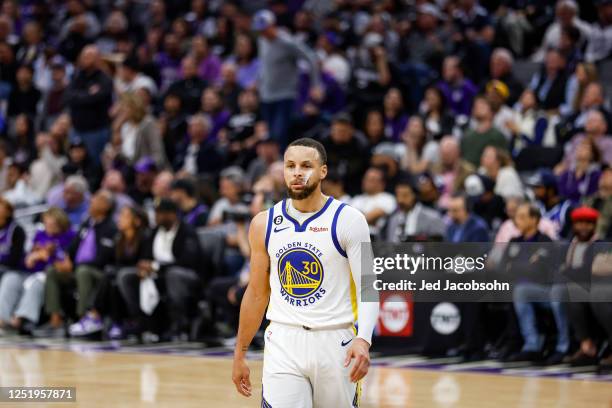 Stephen Curry of the Golden State Warriors walks off the court against the Sacramento Kings during Round 1 Game 2 of the 2023 NBA Playoffs on April...