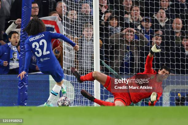 Thibaut Courtois of Real Madrid saves a t close range from Marc Cucurella of Chelsea during the UEFA Champions League quarterfinal second leg match...