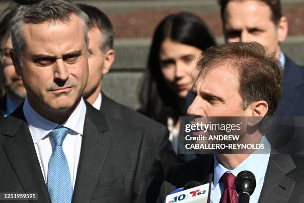 Dominion CEO John Poulos and lawyer Justin Nelson speak to members of the media outside the Leonard Williams Justice Center in Wilmington, Delaware,...