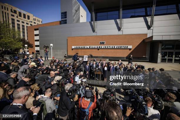 Justin Nelson, attorney for Dominion Voting Systems, center, during a news conference outside Delaware Superior Court in Wilmington, Delaware, US, on...