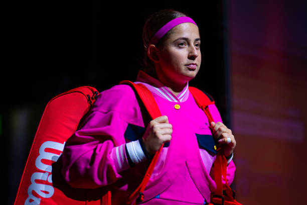 Jelena Ostapenko of Latvia on her way to the court to play against Emma Raducanu of Great Britain in her first-round match at the Porsche Tennis...