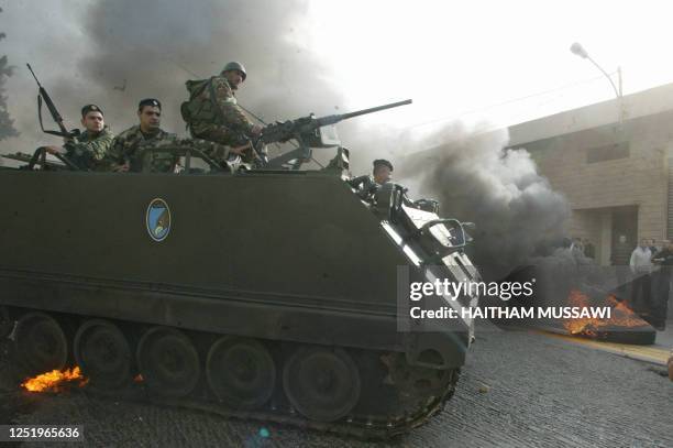 Lebanese troops arrive at the scene of Christian a demonstration in the village of Kahaleh, in the mountains east of Beirut 05 February 2006, where...