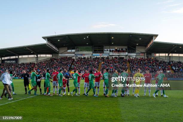 General view of the Racecourse Ground, the home stadium of Wrexham as both teams shake hands during the Vanarama National League match between...