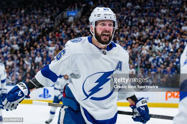 Tampa Bay Lightning Right Wing Nikita Kucherov celebrates a goal by Tampa Bay Lightning Center Brayden Point during the second period of the Round 1...
