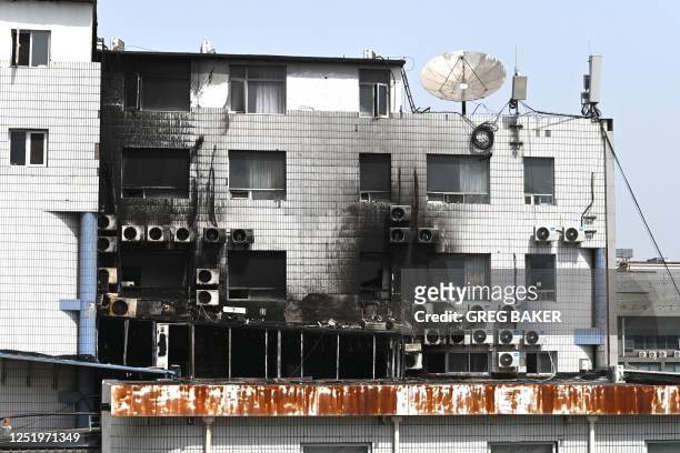 Fire damage is seen at the Changfeng Hospital in Beijing on April 19 after a fire broke out a day earlier. - An investigation was underway on April...