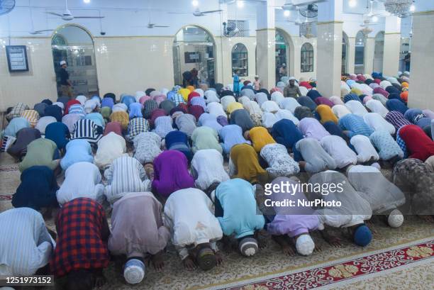 Muslim devotees attend evening prayer at Wekanda Jumma mosque in Colombo on April 18, 2023 The Islamic calendar's holiest eve is known as...