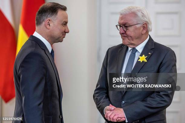 Polish President Andrzej Duda and German President Frank-Walter Steinmeier arrive for a meeting at the Presidential Palace in Warsaw, Poland, on...