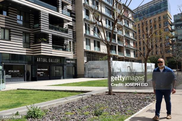 Man walks past the Artual Gellery in Beirut on April 19 an art gallery owned by Hind Ahmad, the daughter of Nazem Said Ahmad, whom the US Treasury...