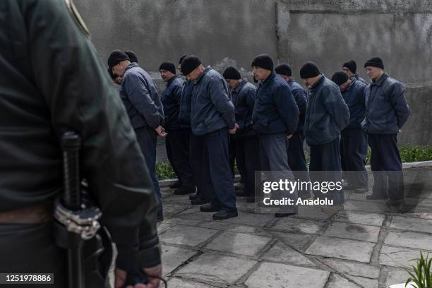 Group of Russian soldiers captured during the war in Ukraine lines up in A Ukrainian prison in western Ukraine, Ukraine on April 18, 2023.