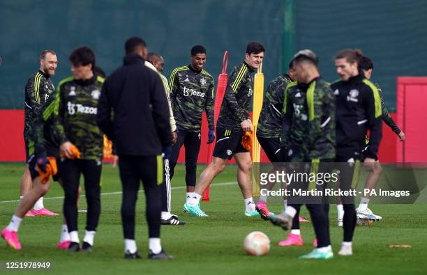 Manchester United's Harry Maguire and team-mates during a training session at Trafford Training Centre, Manchester. Picture date: Wednesday April 19,...
