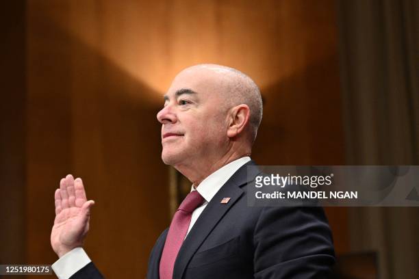 Homeland Security Secretary Alejandro Mayorkas is sworn in during the Senate Homeland Security and Governmental Affairs hearing on the fiscal year...