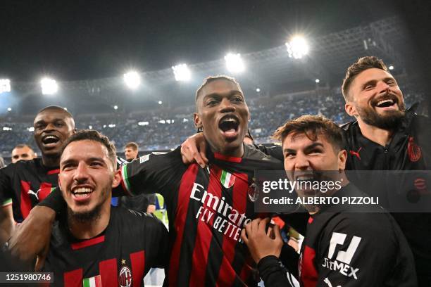 Milan's French defender Pierre Kalulu, AC Milan's Algerian defender Ismael Bennacer, AC Milan's Portuguese forward Rafael Leao, AC Milan's Spanish...