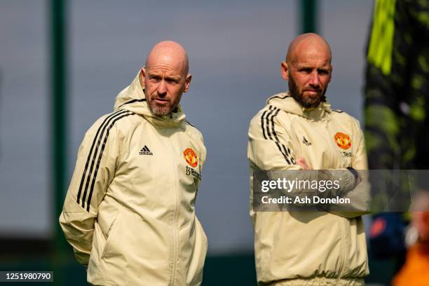 Coach Mitchell van der Gaag looks on with Manchester United Head Coach / Manager Erik ten Hag during a first team training session at Carrington...