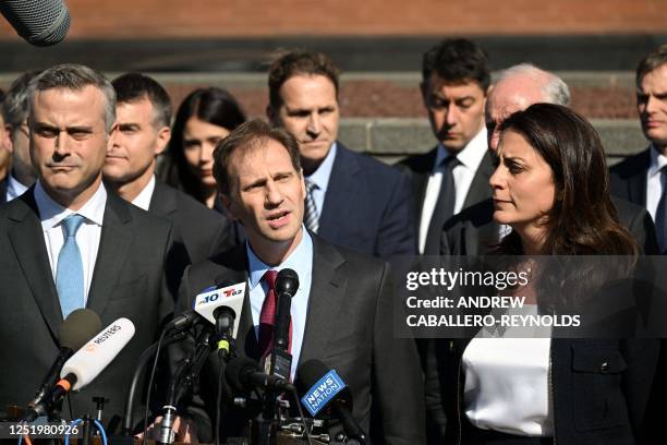 Justin Nelson, joined by fellow members of the Dominion Voting Systems legal team, speaks to members of the media outside the Leonard Williams...
