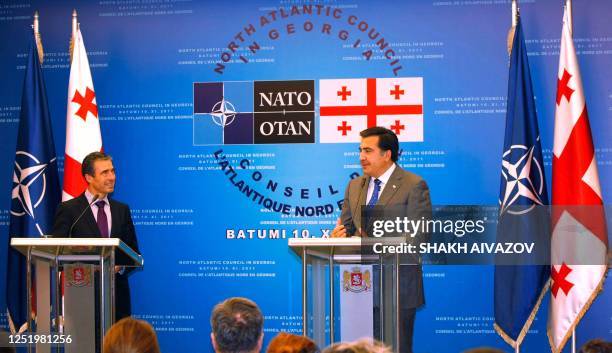 Georgian President Mikhail Saakashvili speaks alongside NATO Secretary General Anders Fogh Rasmussen during a press conference in Batumi after their...