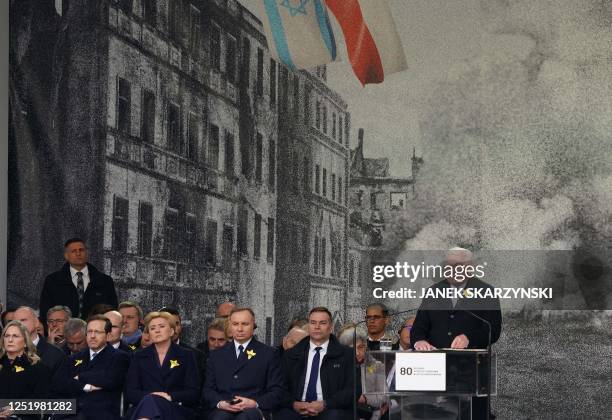 German President Frank-Walter Steinmeier delivers a speech as the Israeli President's wife Michal Herzog , Israel's President Isaac Herzog , Polish...