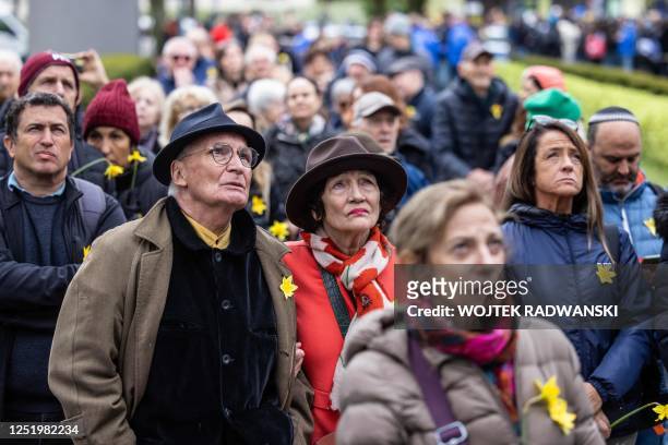 People attend a public viewing during ceremonies marking the 80th anniversary of the start of the Warsaw Jewish Ghetto Uprising, Warsaw, Poland on...
